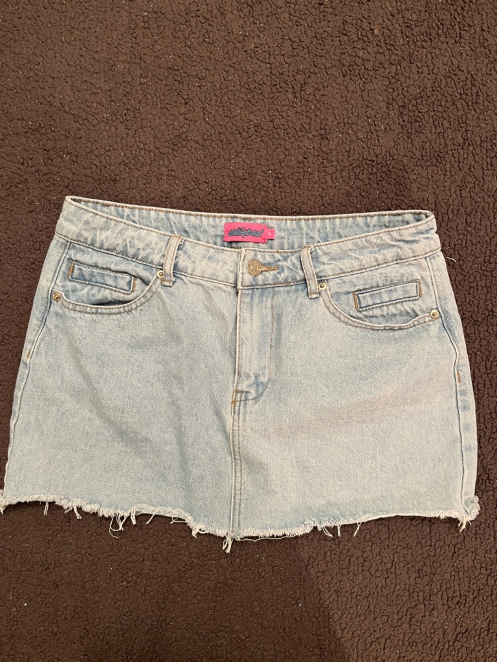 Edikted Light Wash Denim Mini Skirt with Frayed Hem